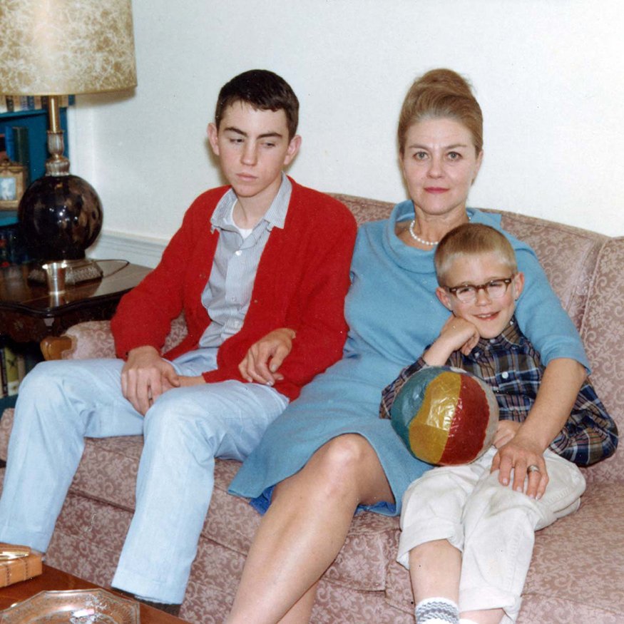 Frank with his mother and younger brother Eric on the sofa