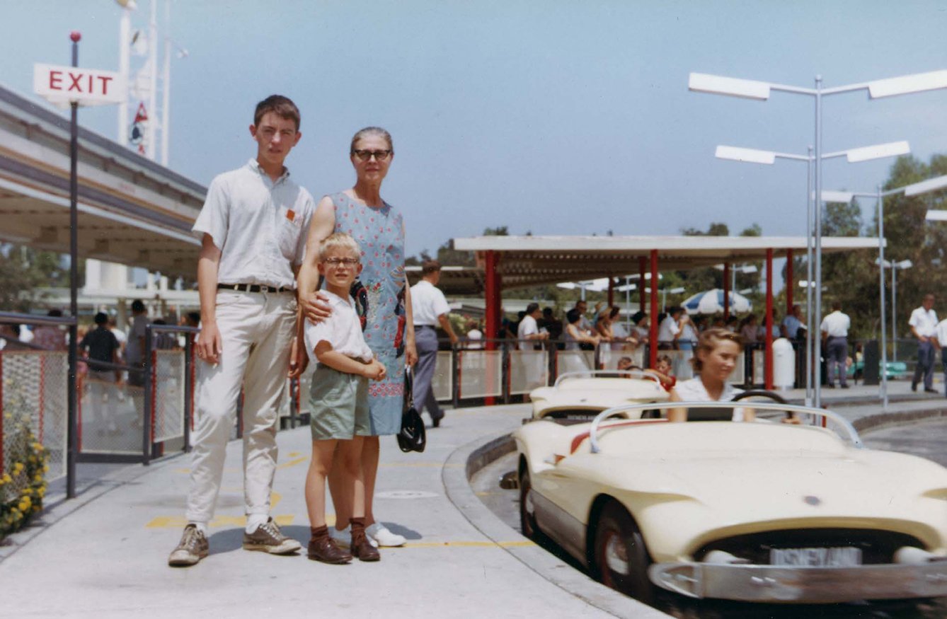 Frank, his mother and young Eric at an amusement park
